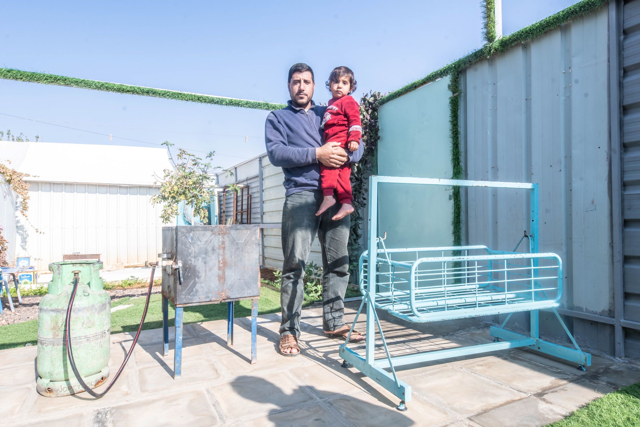 Arif is a very talented craftsman. He has built a seesaw for his little daughter using some of the few materials that can be found in the camp. He also converted a broken oven into a gas heater - upcycling and innovation at its best.