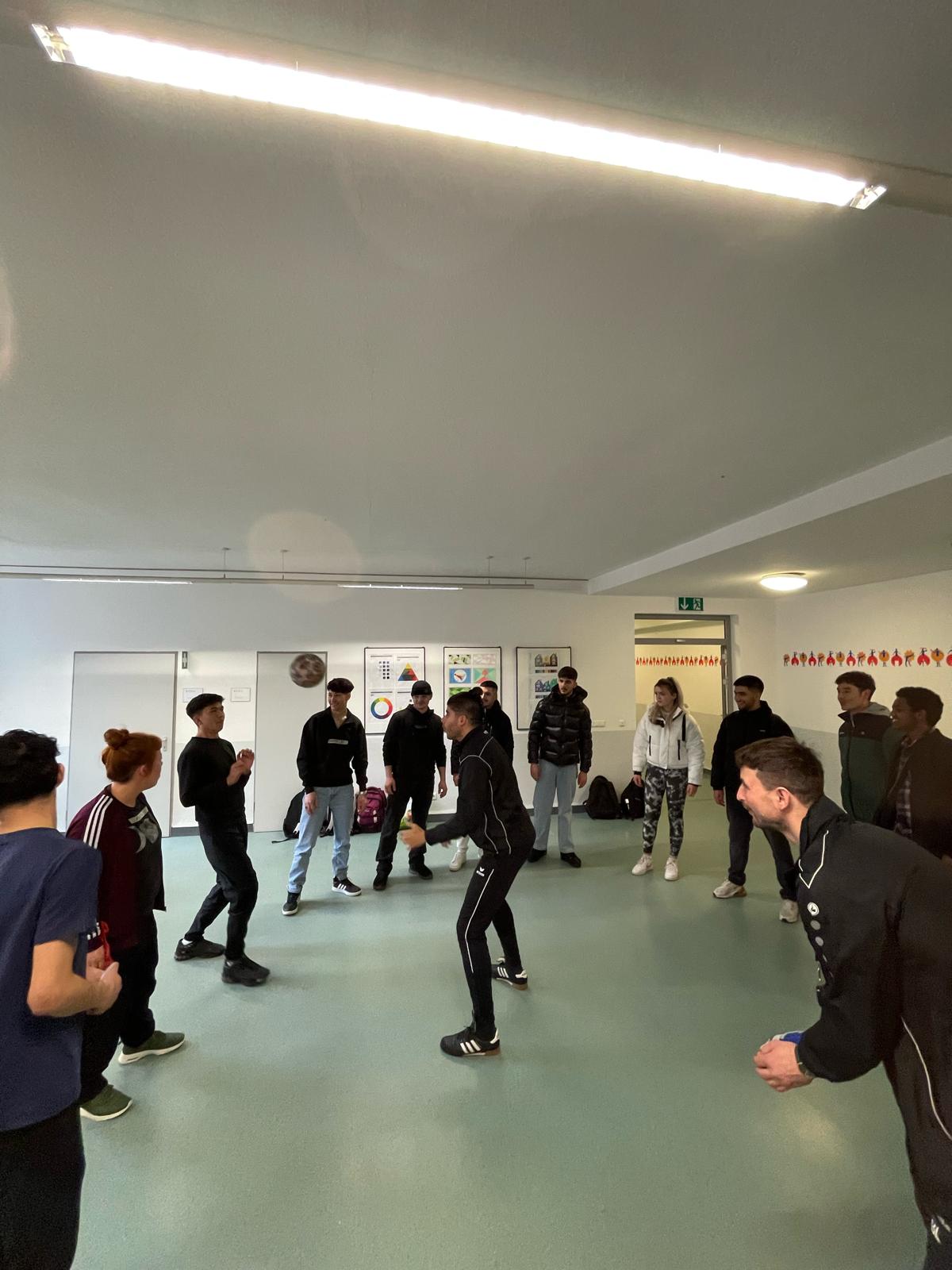 Teamaufnahme durch Kopfball